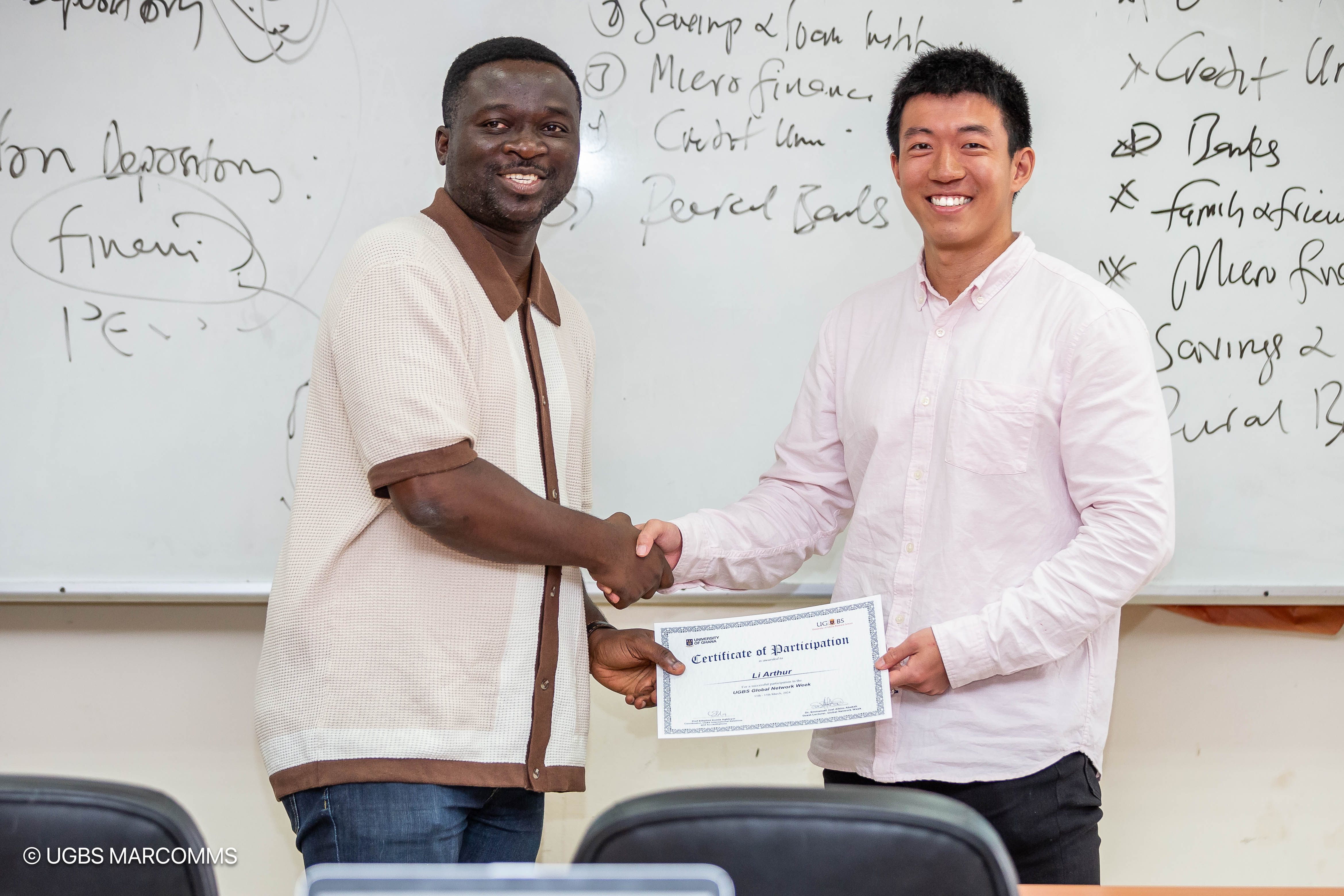 Arthur with professor at UGBS