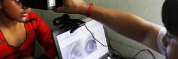 eye scan between woman and official